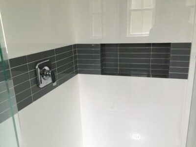 Tile Inlay precision_marble_cultured_bathroom_tile_inlay_shower-bathtub-victoria-home-renovations