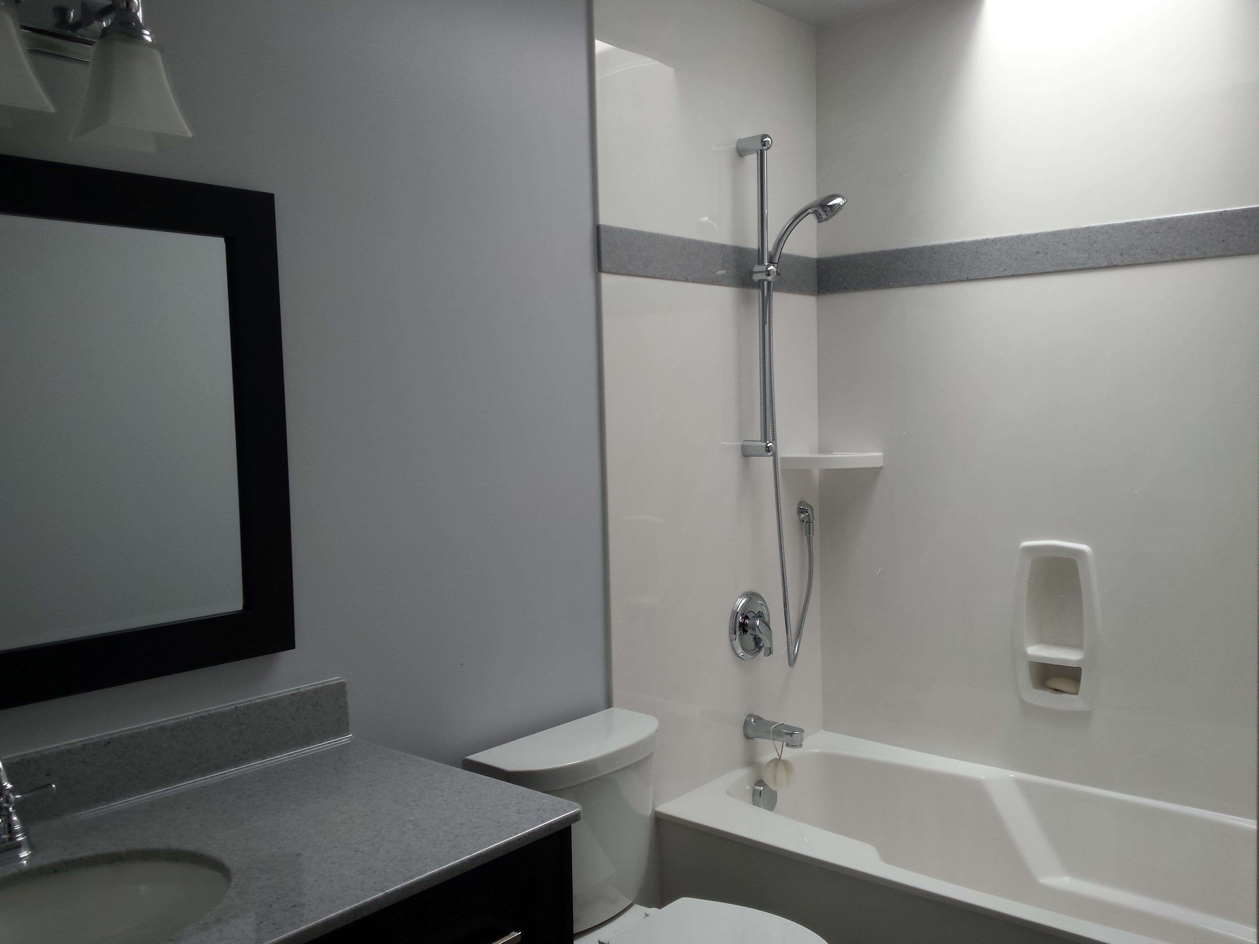 precision_marble_cultured_bathroom_tile_inlay_shower-bathtub-victoria-home-renovations